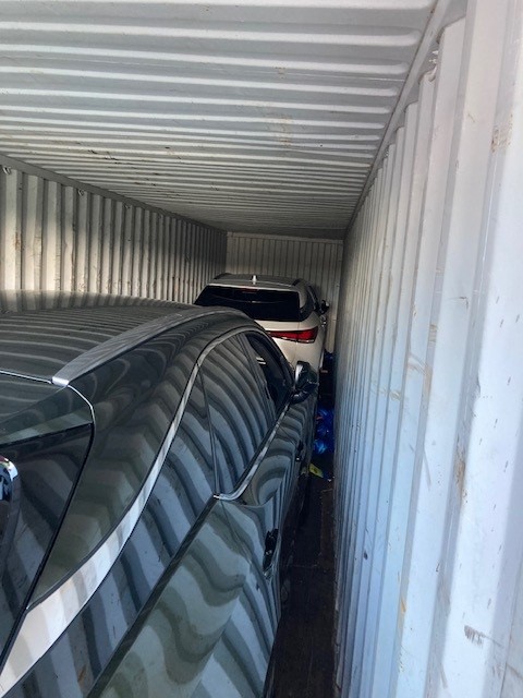 Cars in container for export