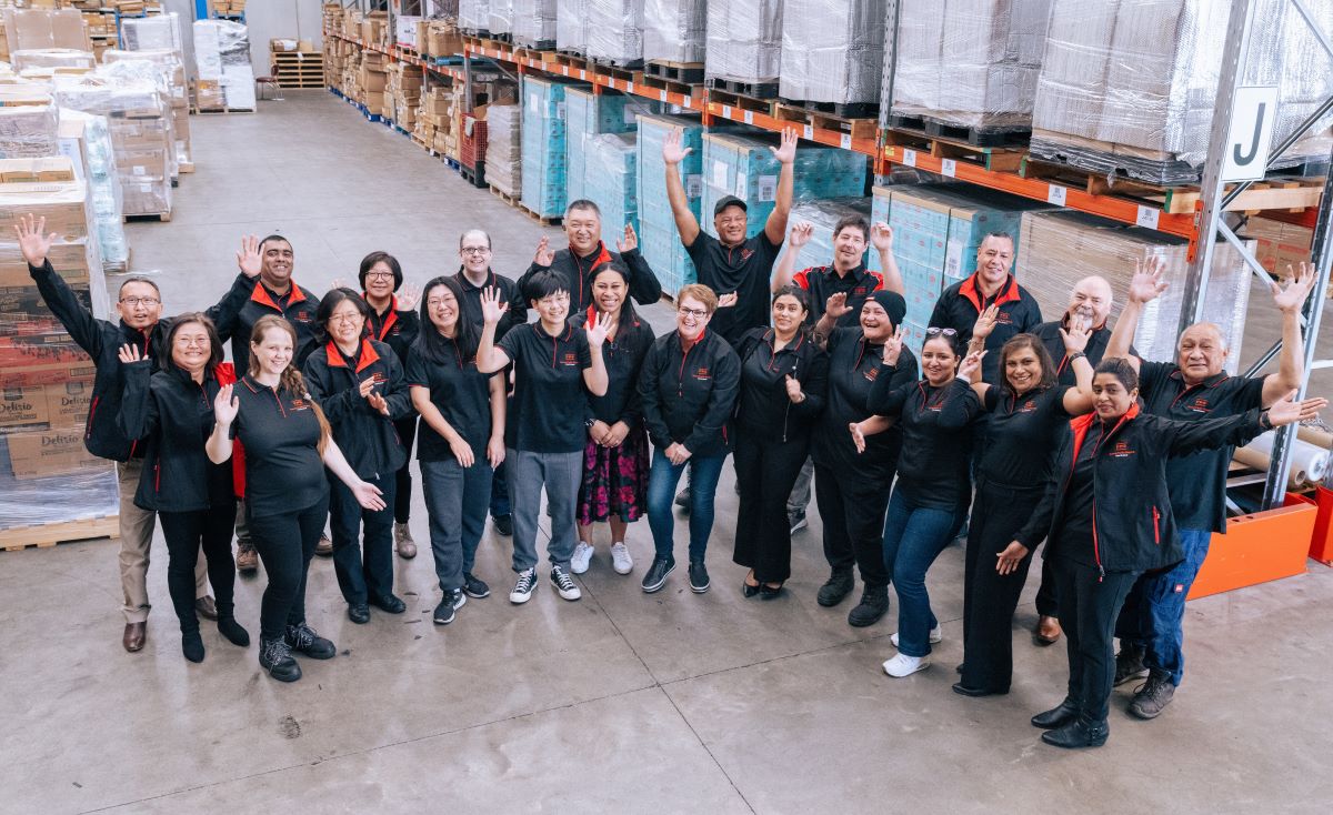 Famous Pacific Shipping NZ team in the warehouse